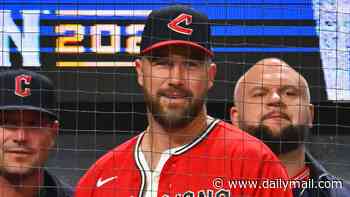 Travis Kelce makes surprise appearance at Cleveland Guardians' crucial playoff win after buying stake in team... but there's no sign of wife Taylor Swift