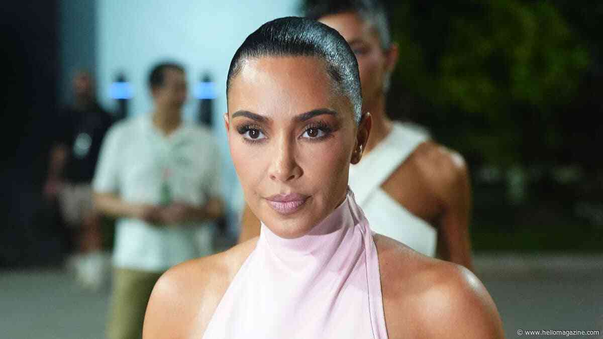 Kim Kardashian, 45, stuns in sheer pink dress as she supports Lewis Hamilton at Singapore Grand Prix