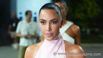 Kim Kardashian, 45, stuns in sheer pink dress as she supports Lewis Hamilton at Singapore Grand Prix