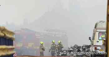 Fire crews battle through night to extinguish huge fire in Glasgow scrapyard