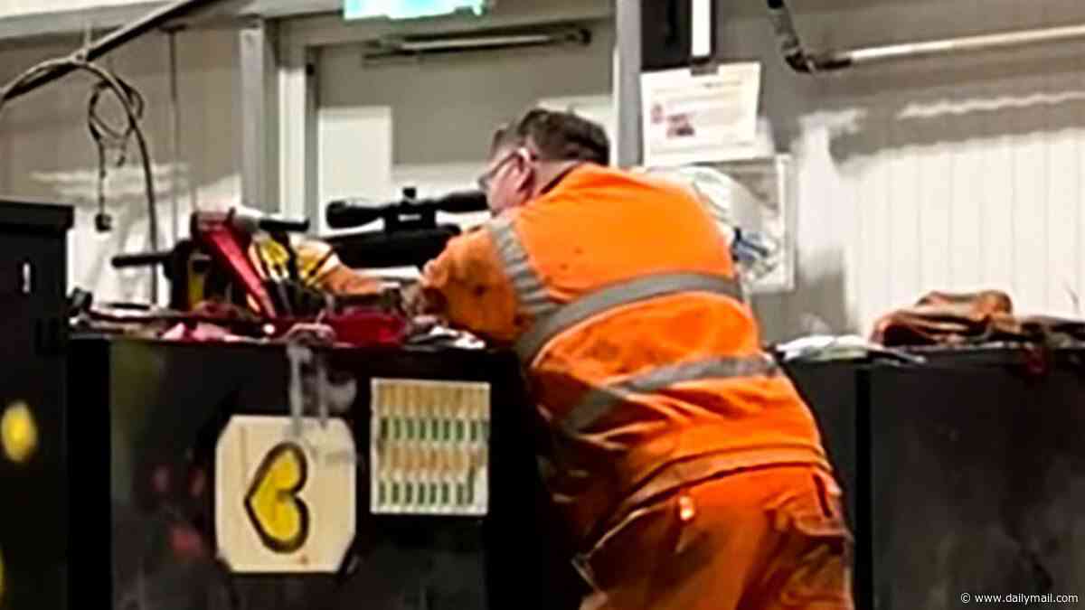 Moment HS2 night-shift workers fire a powerful air rifle inside workshop - as five are sacked from &pound;100billion rail project