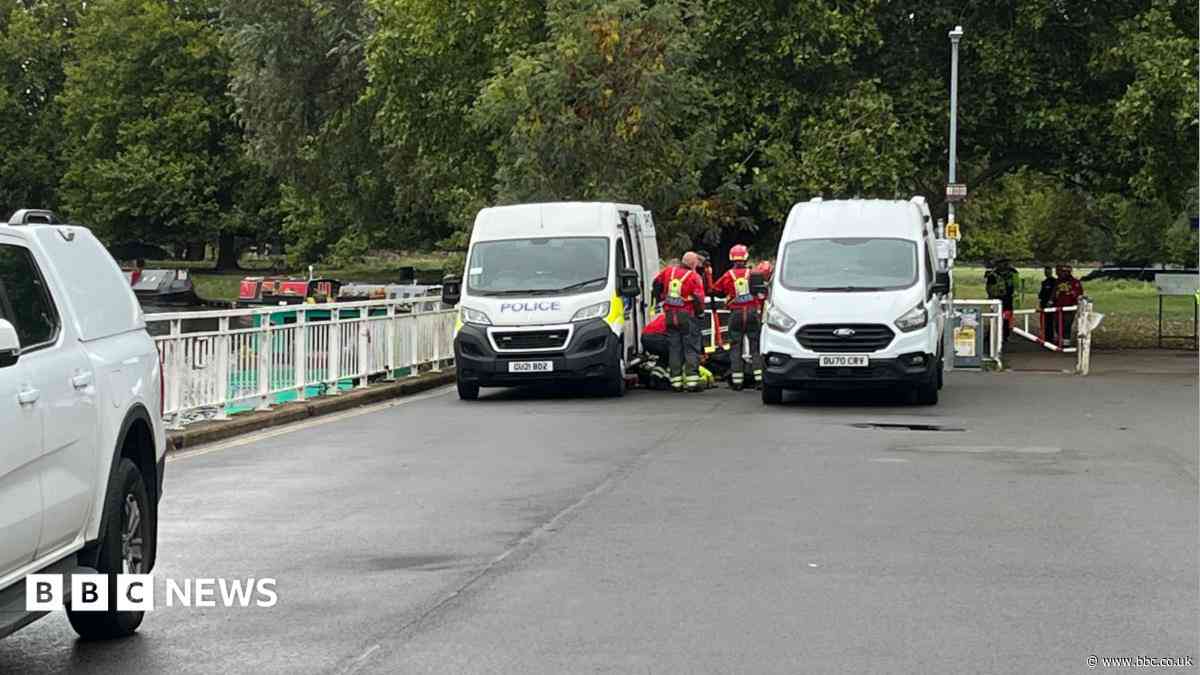 Emergency services search river for person