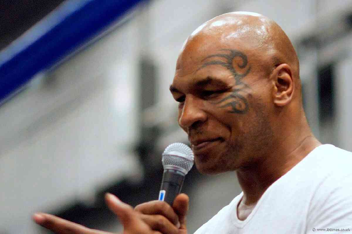 Mike Tyson Appears To Shut Down Natalie Harp With 'I'm Busy on the Phone,' Lip Reader Claims