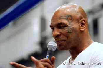 Mike Tyson Appears To Shut Down Natalie Harp With 'I'm Busy on the Phone,' Lip Reader Claims