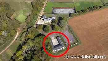 Businessman secretly living inside a 'granny flat' hidden inside a horse stable on his £2.25million Cotswolds estate for nearly TEN YEARS must tear it down