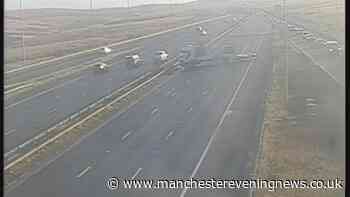 Woman seriously hurt in horror M62 crash as man arrested