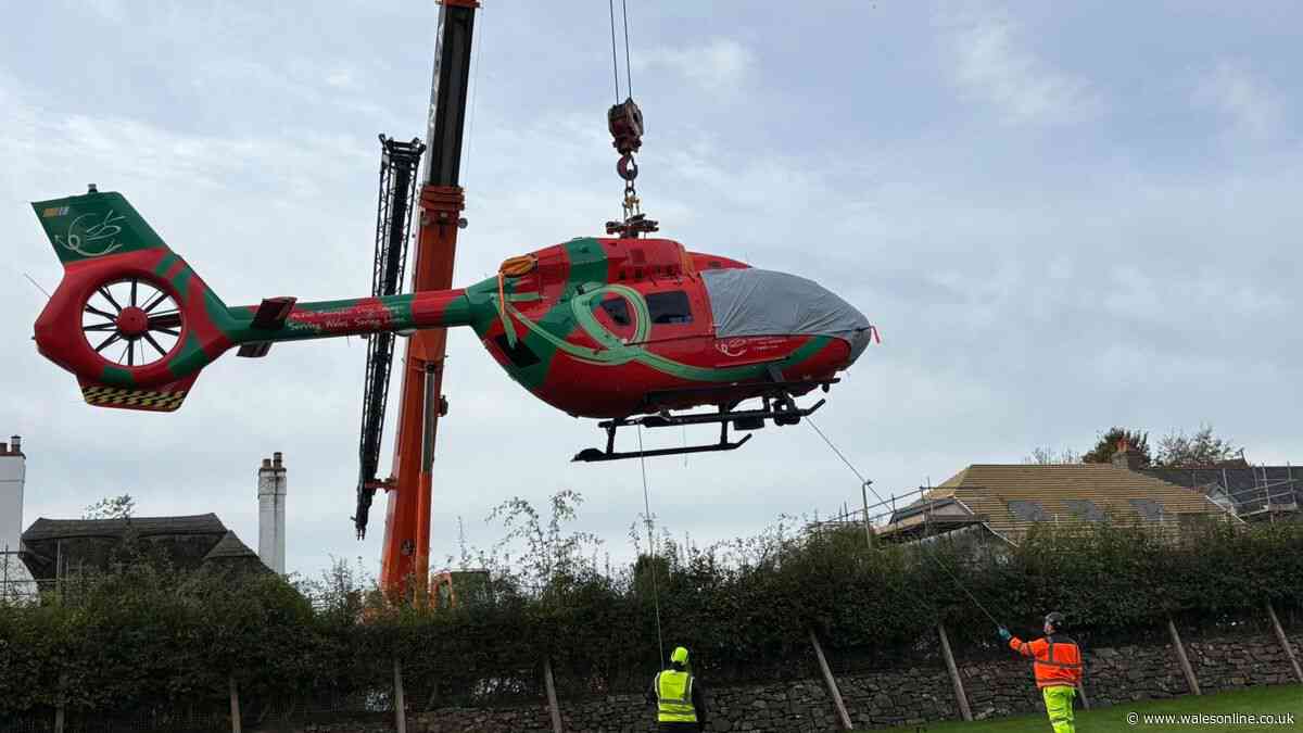Air ambulance helicopter stuck in field for days after hitting football goal while landing