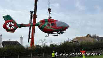 Air ambulance helicopter stuck in field for days after hitting football goal while landing
