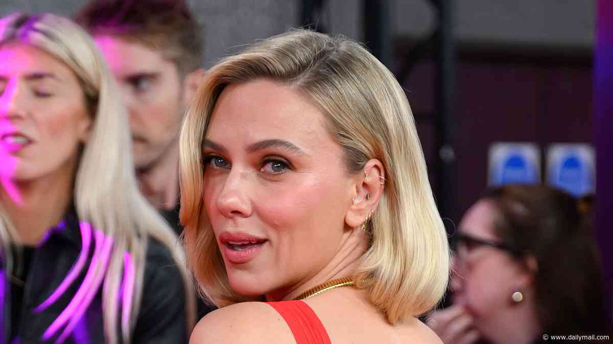 Scarlett Johansson shows off her huge back tattoo as she wows in a plunging red dress at BFI London Film Festival premiere of Paper Tiger