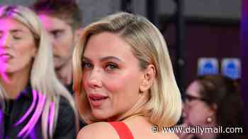 Scarlett Johansson shows off her huge back tattoo as she wows in a plunging red dress at BFI London Film Festival premiere of Paper Tiger