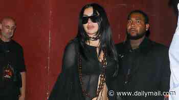 Charli XCX wows in a lace bra and barely-there hotpants as she hits the red carpet at star-studded Hollywood party