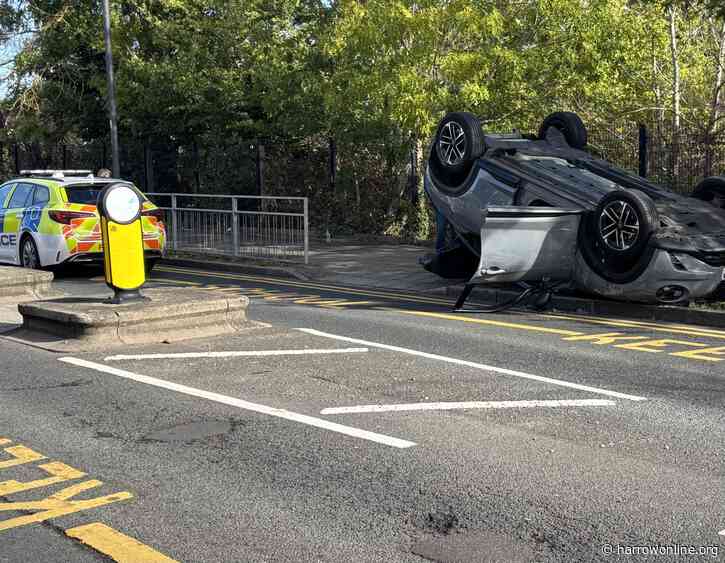 Woman taken to hospital after car overturns in Stanmore