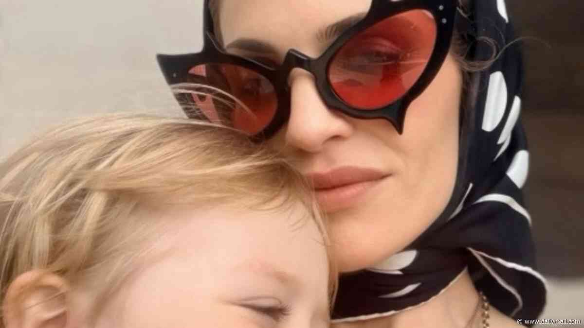 Kelly Osbourne says she wants to give son Sidney 'a different childhood to mine' as she swaps life on the road with Slipknot star ex for an English farm and PTA meetings at village school