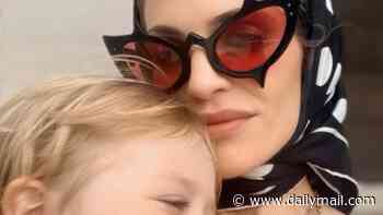 Kelly Osbourne says she wants to give son Sidney 'a different childhood to mine' as she swaps life on the road with Slipknot star ex for an English farm and PTA meetings at village school