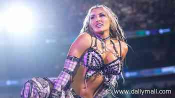 Horrifying moment glamorous WWE star lands on her head after dropping from 15-foot ladder narrowly avoiding catastrophic injury