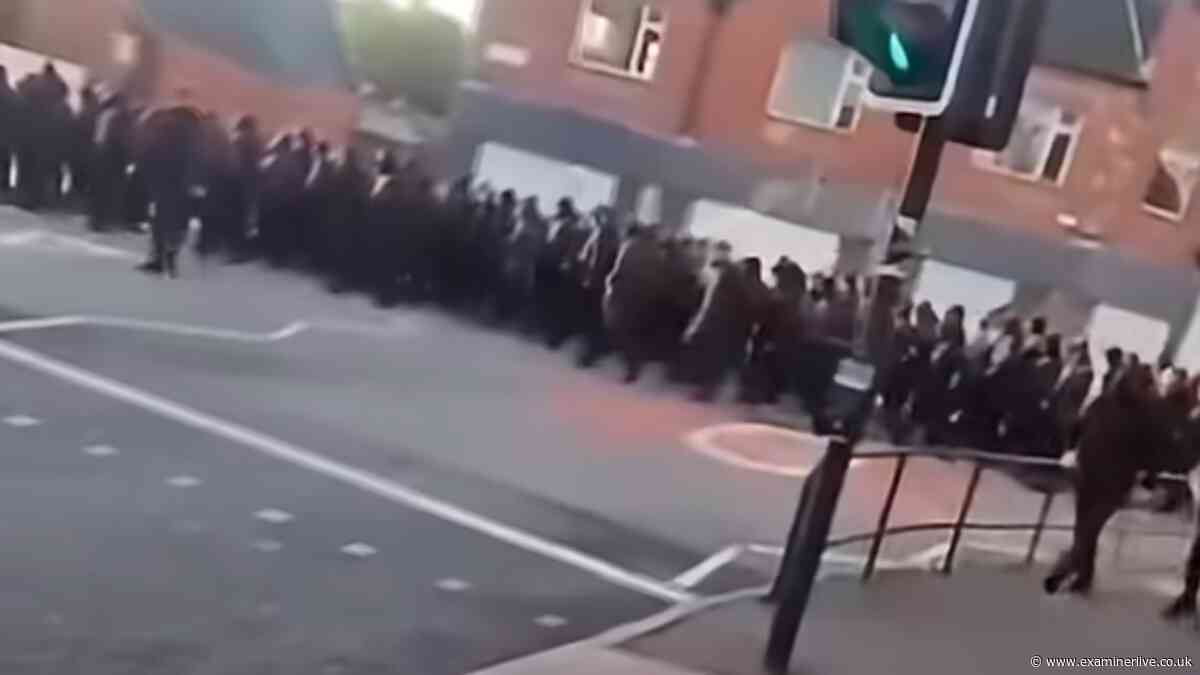 Hooded protesters march to Sheffield bus depot in early hours
