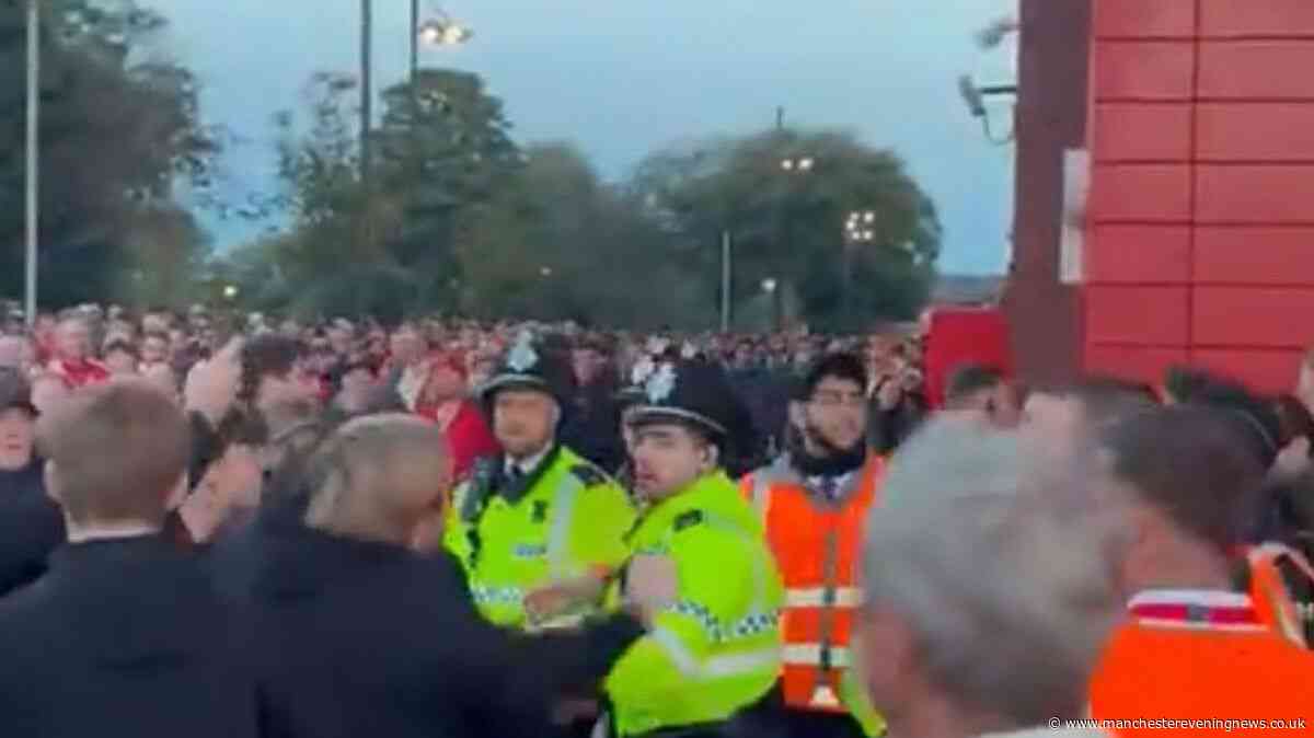 Fans clash with police outside Anfield after Man City defeat Liverpool