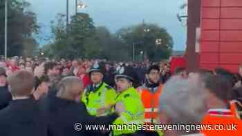 Fans clash with police outside Anfield after Man City defeat Liverpool