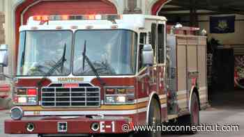 2 extricated from vehicle after crashing into tree in Hartford