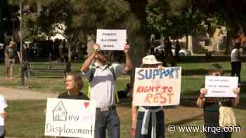 Homeless advocates sit in at Albuquerque park defying new city imposed limited hours