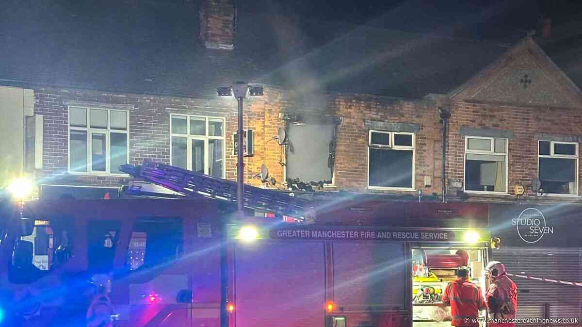 Cordon in place as fire tears through flat above Chorlton shop
