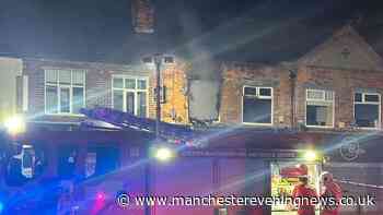 Cordon in place as fire tears through flat above Chorlton shop