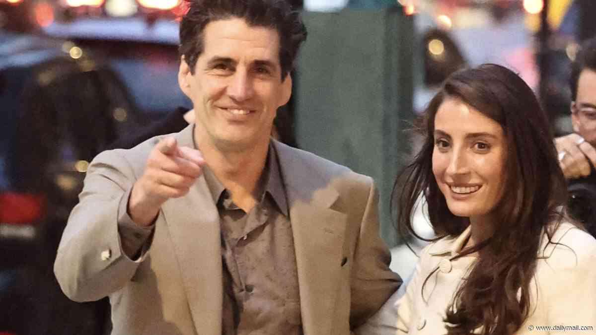 Here comes the bride! Andy Lee's fiancée Rebecca Harding wears a chic bridal-inspired outfit during a romantic stroll with the comedian in the Big Apple as couple prepare for New York wedding