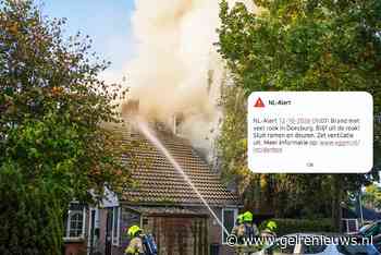 UPDATE: Vlammen slaan uit dak hoekwoning, traumahelikopter landt bij grote brand