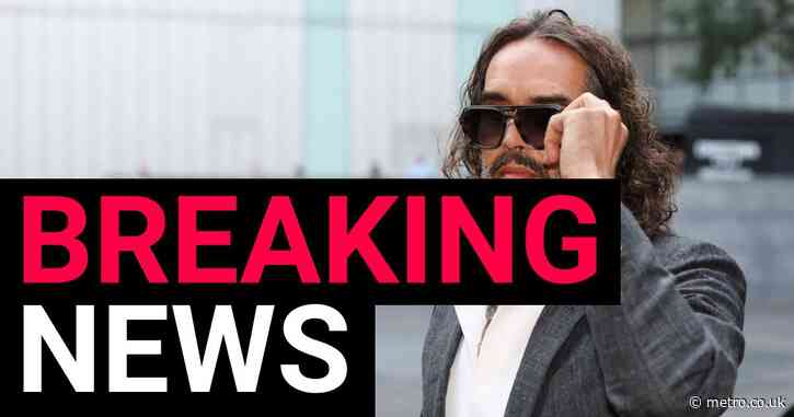 Russell Brand arrives at court with wife Laura for rape and sex assault trial