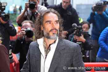 Russell Brand arrives at court for start of rape and sexual assault trial