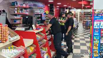 Suspected crime gang cash seized in shop raids