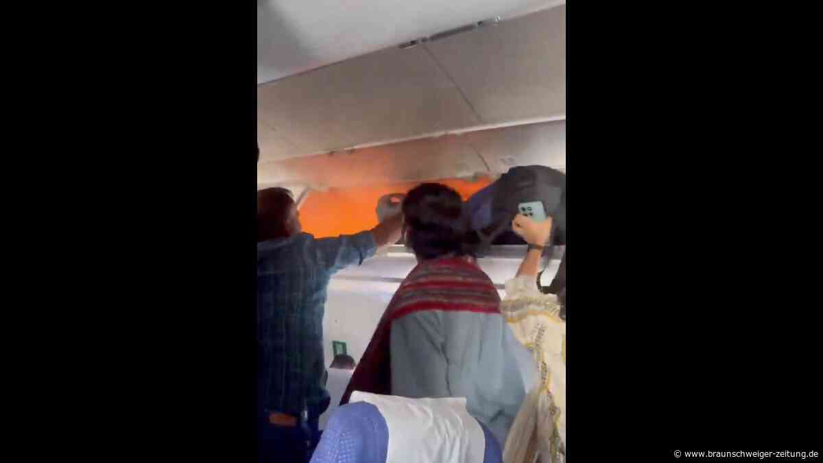 Powerbank fängt Feuer: Flugzeug muss notlanden – Video zeigt dramatische Szenen