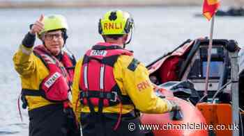 Father and son stranded on disappearing sand bank rescued on Northumberland coast