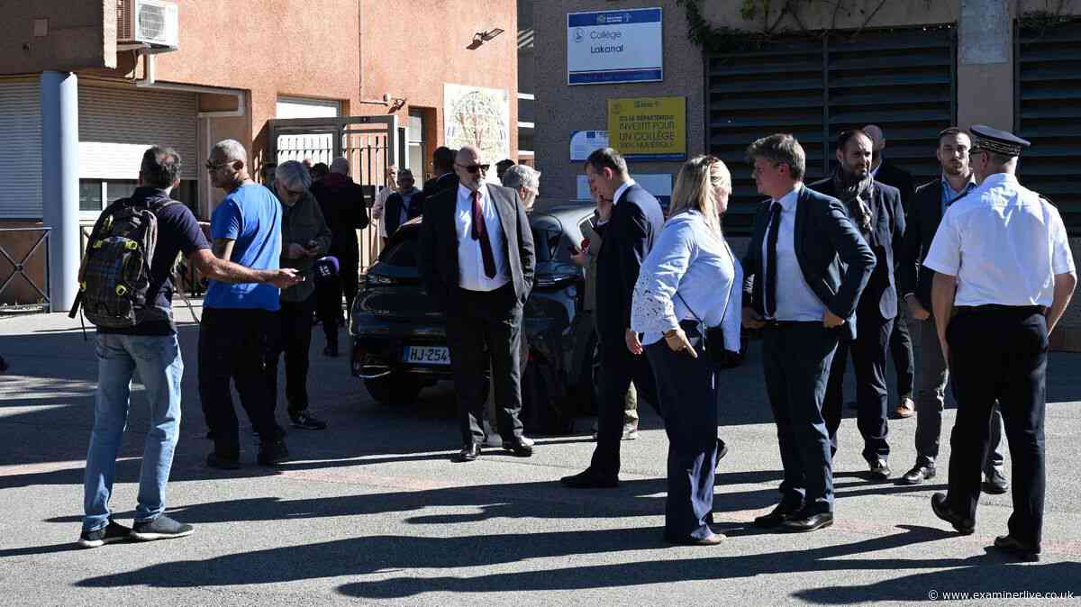 Head and teacher 'shot by boy, 14, who hid shotgun in guitar case' in France
