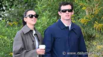 Dua Lipa and Callum Turner look the picture of newlywed bliss as they walk their dog in NYC