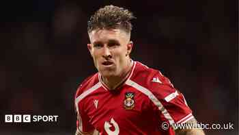 Wrexham ease fears over Windass injury