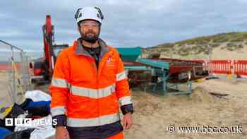 Plastic pellet clean-up resumes on beach