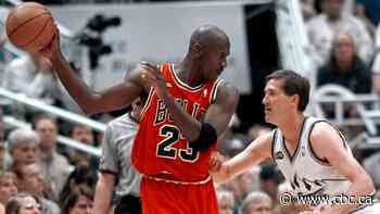 Michael Jordan jersey sets $14M US record for basketball memorabilia, auction house says