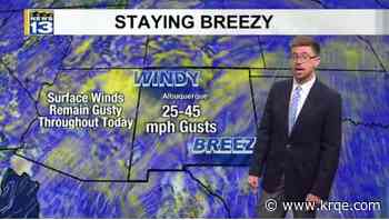 Drier air returns, breezy winds stick around for Monday