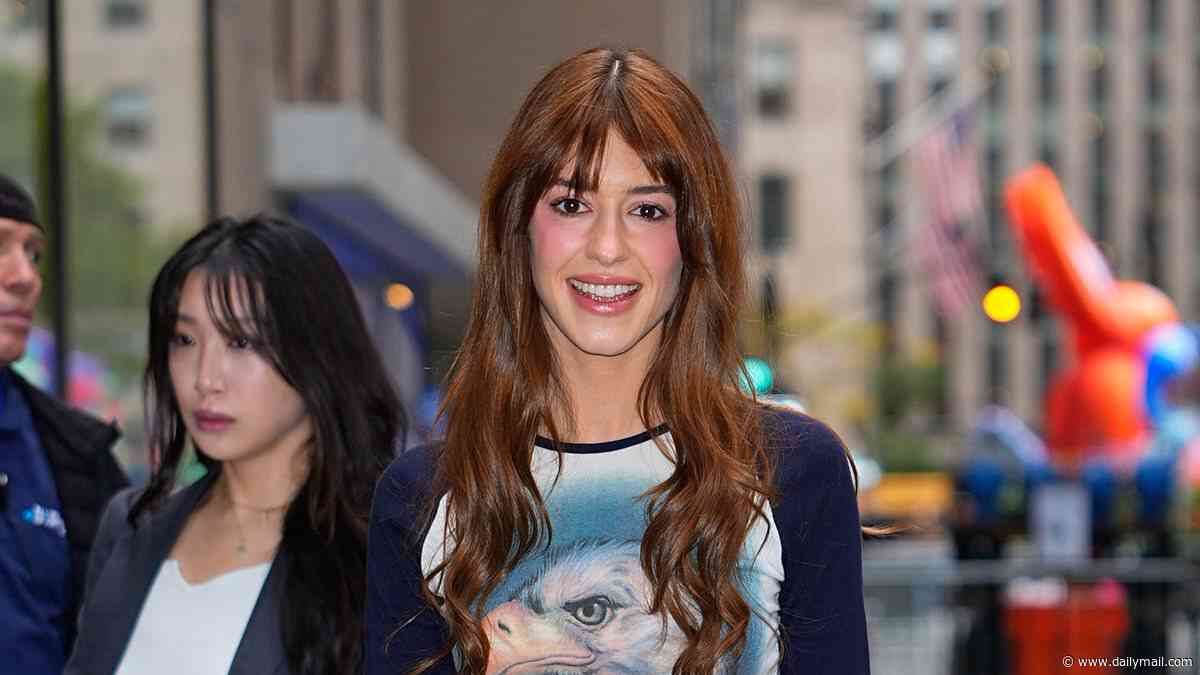 Daisy Edgar-Jones steps out in a daring satin mini skirt and bird motif top before changing into leather flares while leaving NBC in New York