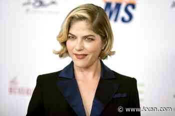 Selma Blair taken into custody, hospitalized after allegedly trying to open plane door