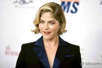 Selma Blair taken into custody, hospitalized after allegedly trying to open plane door