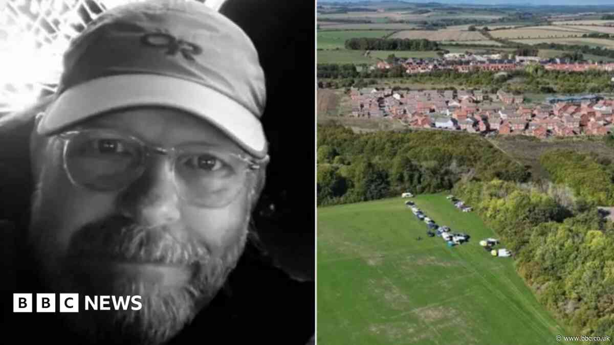 Cordon removed at scene of dog walker's death