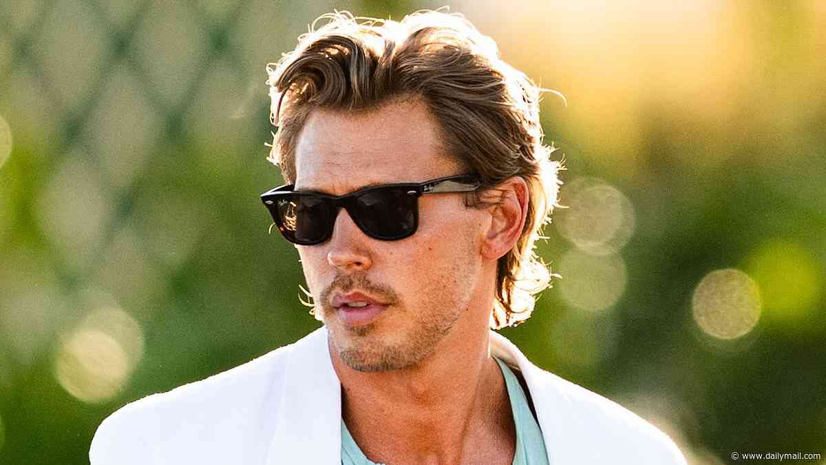 Austin Butler dons iconic white suit as he films Miami Vice remake alongside Danny Ramirez