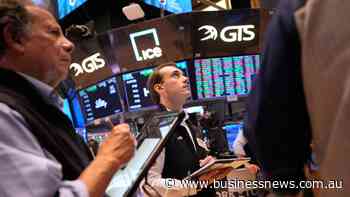 Nasdaq falls ahead of earnings, economic data