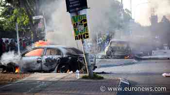 Cars burned and shops looted as anti-immigration protests rock South Africa