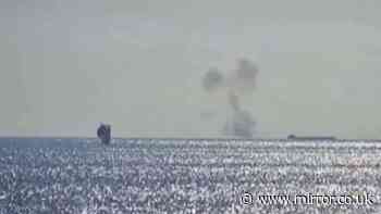 Russian drones hit ships and sink one on edge of NATO territory in 'unacceptable' attack