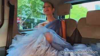 Myleene Klass struggles to fit her HUGE ballgown in the back of a cab as she works on her latest project after saying she's 'too busy' for Hear'Say and Liberty X reunion tour