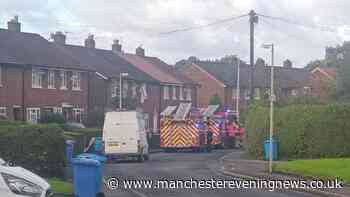 'Screams' heard as firefighters rush to Salford house fire