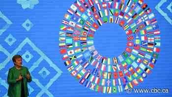 IMF warns of risks from AI boom and debt, but raises forecast for world growth